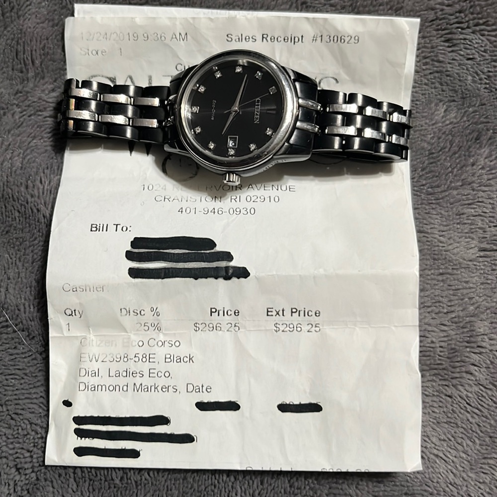 Woman Citizens Ecodrive watch with diamond markers.
